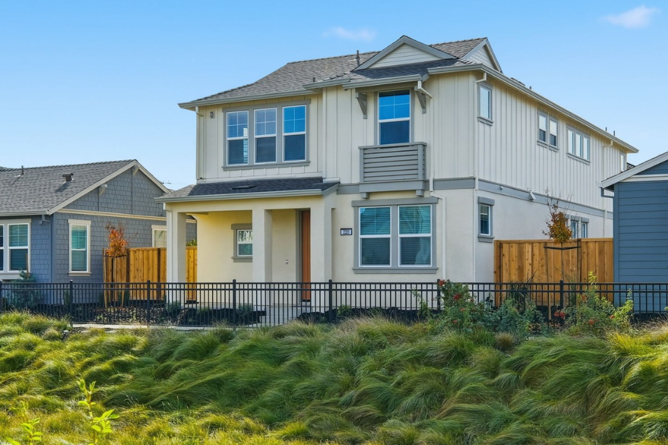 A house with a fence around it.