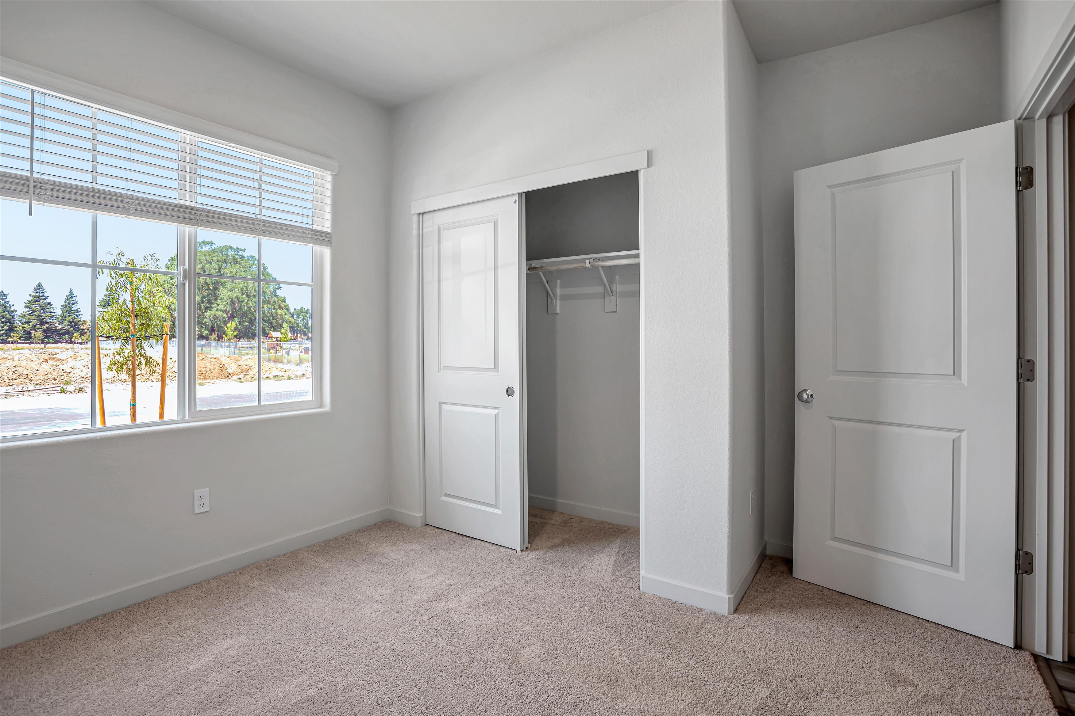 A room with white doors.