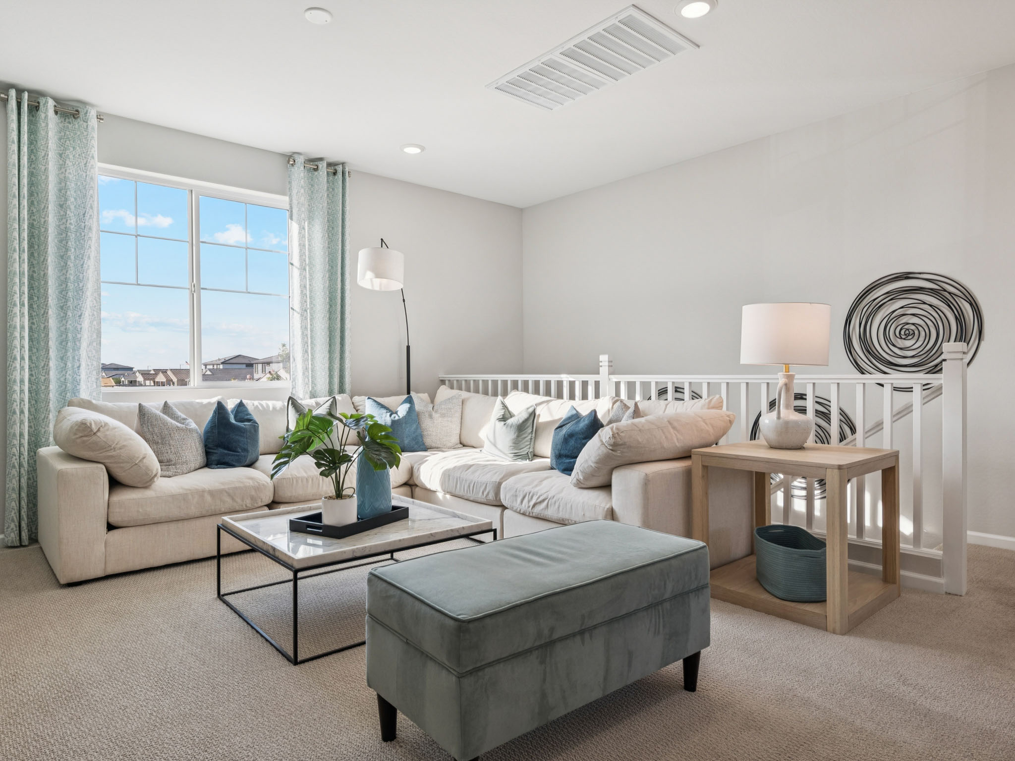 A living room with a couch and a coffee table.