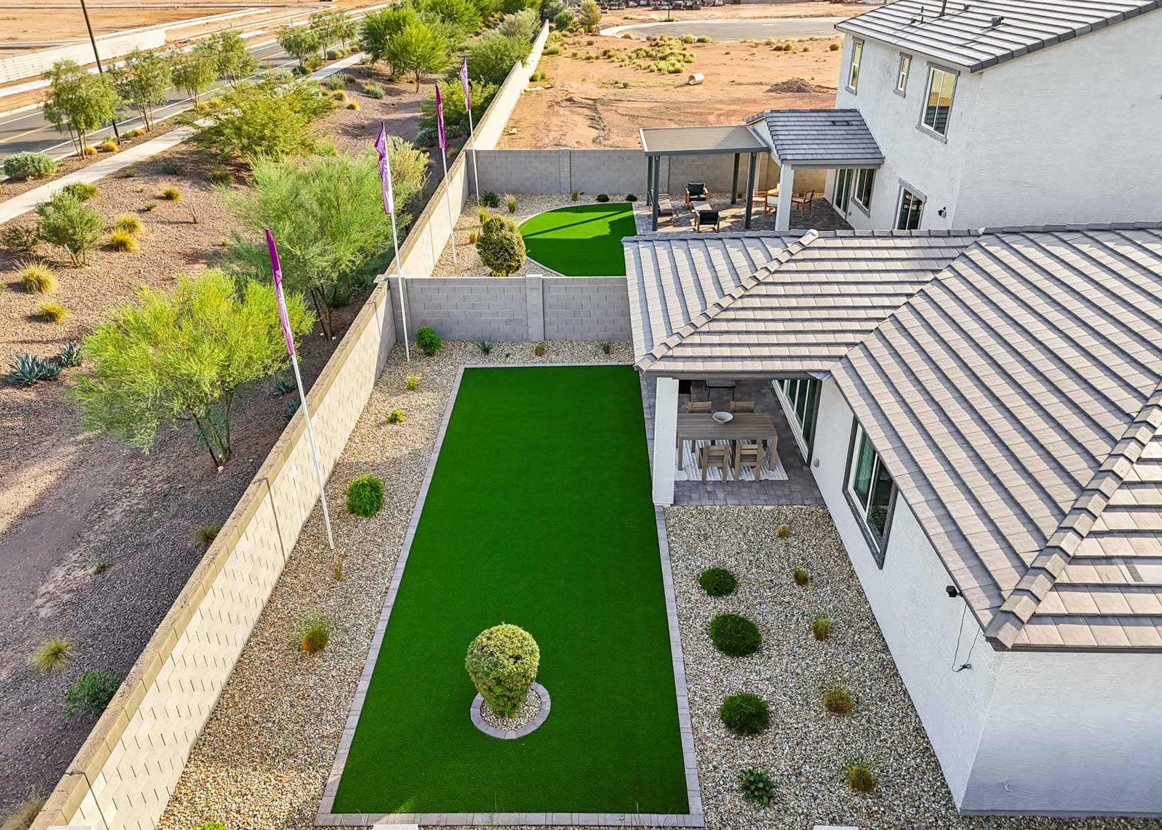 A backyard with a pool.