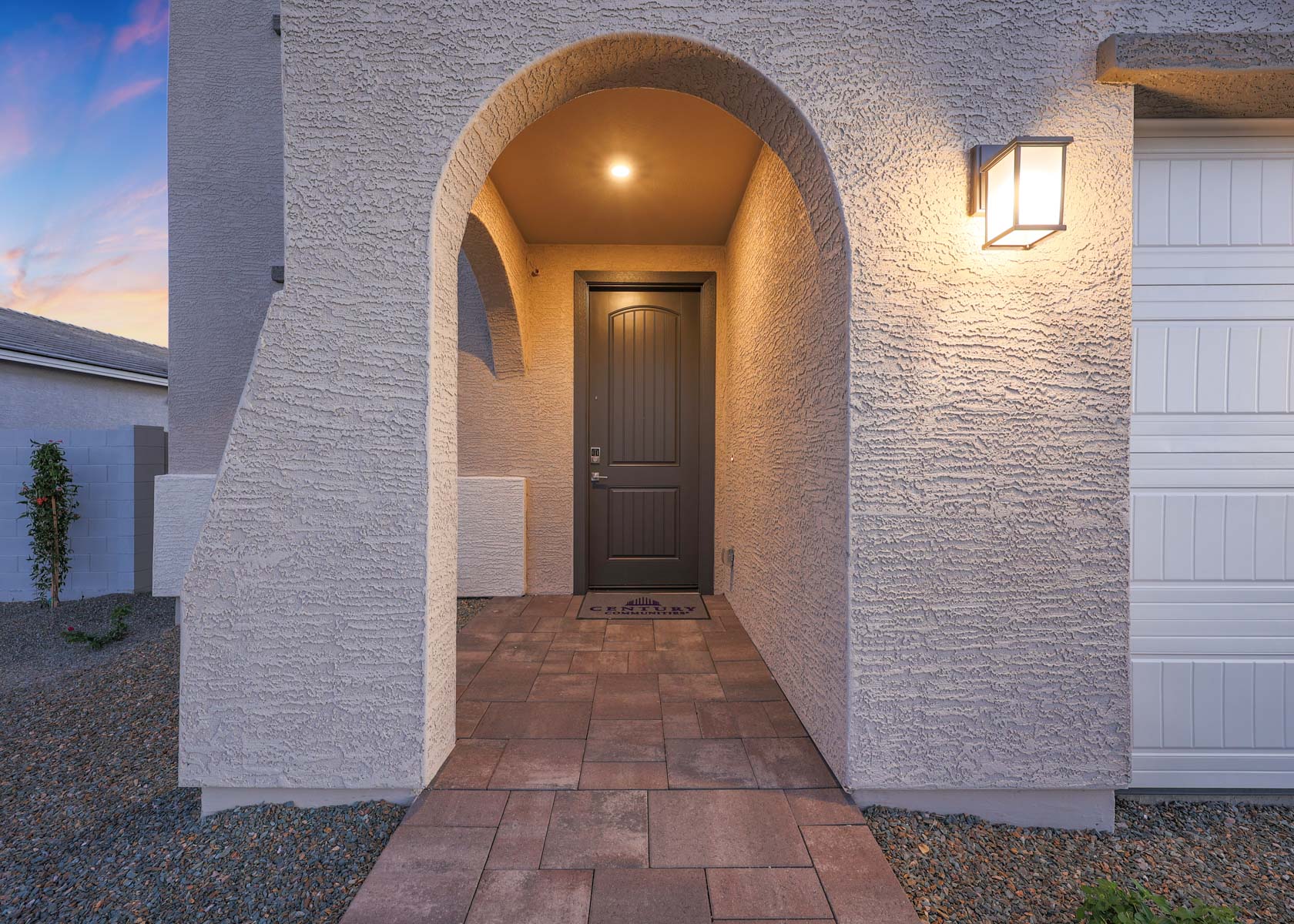 A building with a brick walkway.