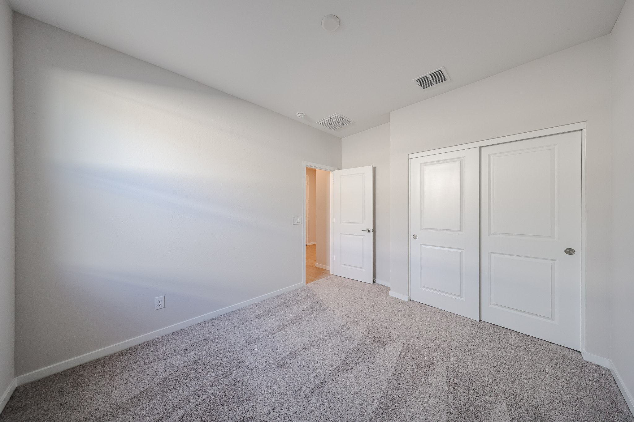 A room with white doors.