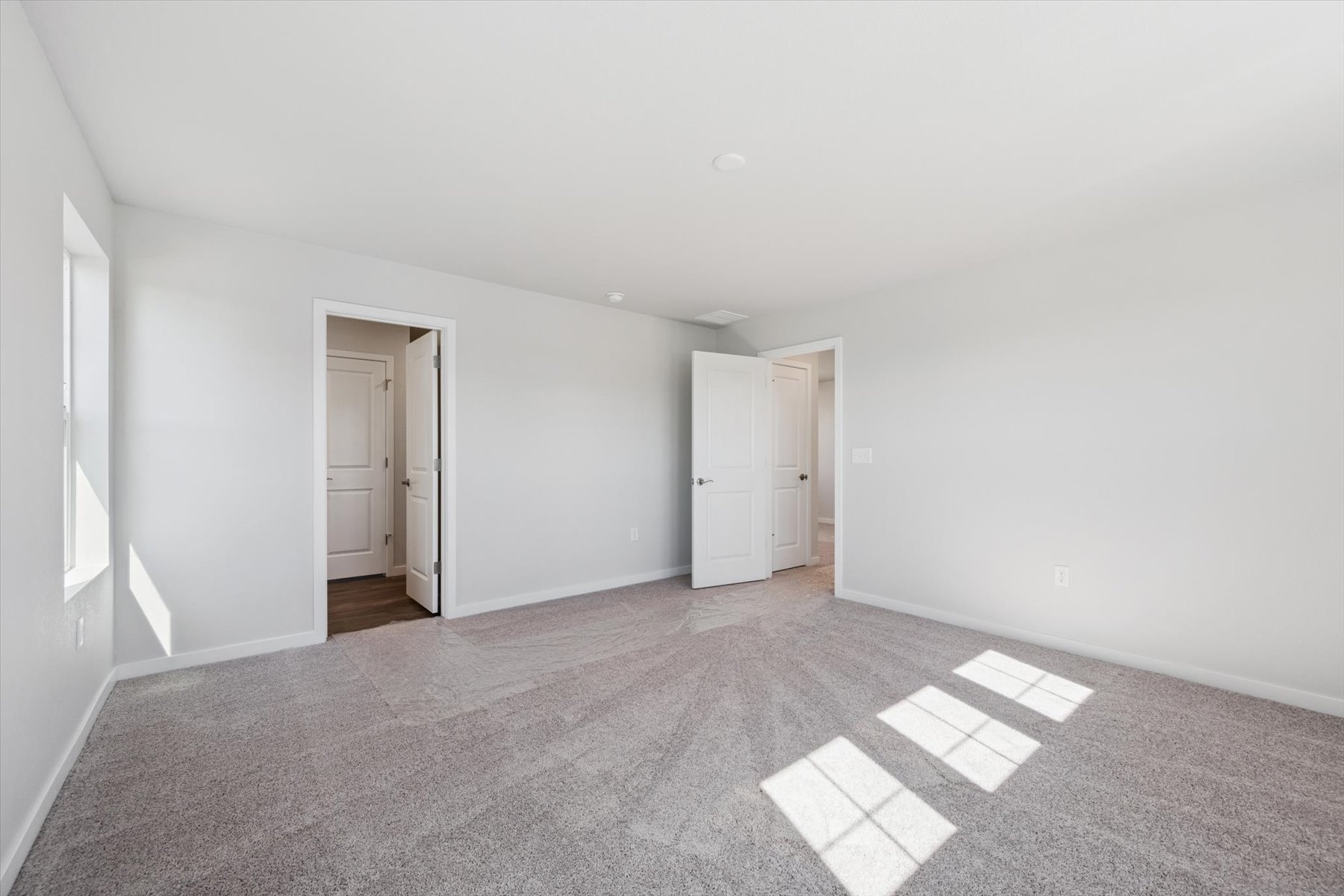 A room with white doors.