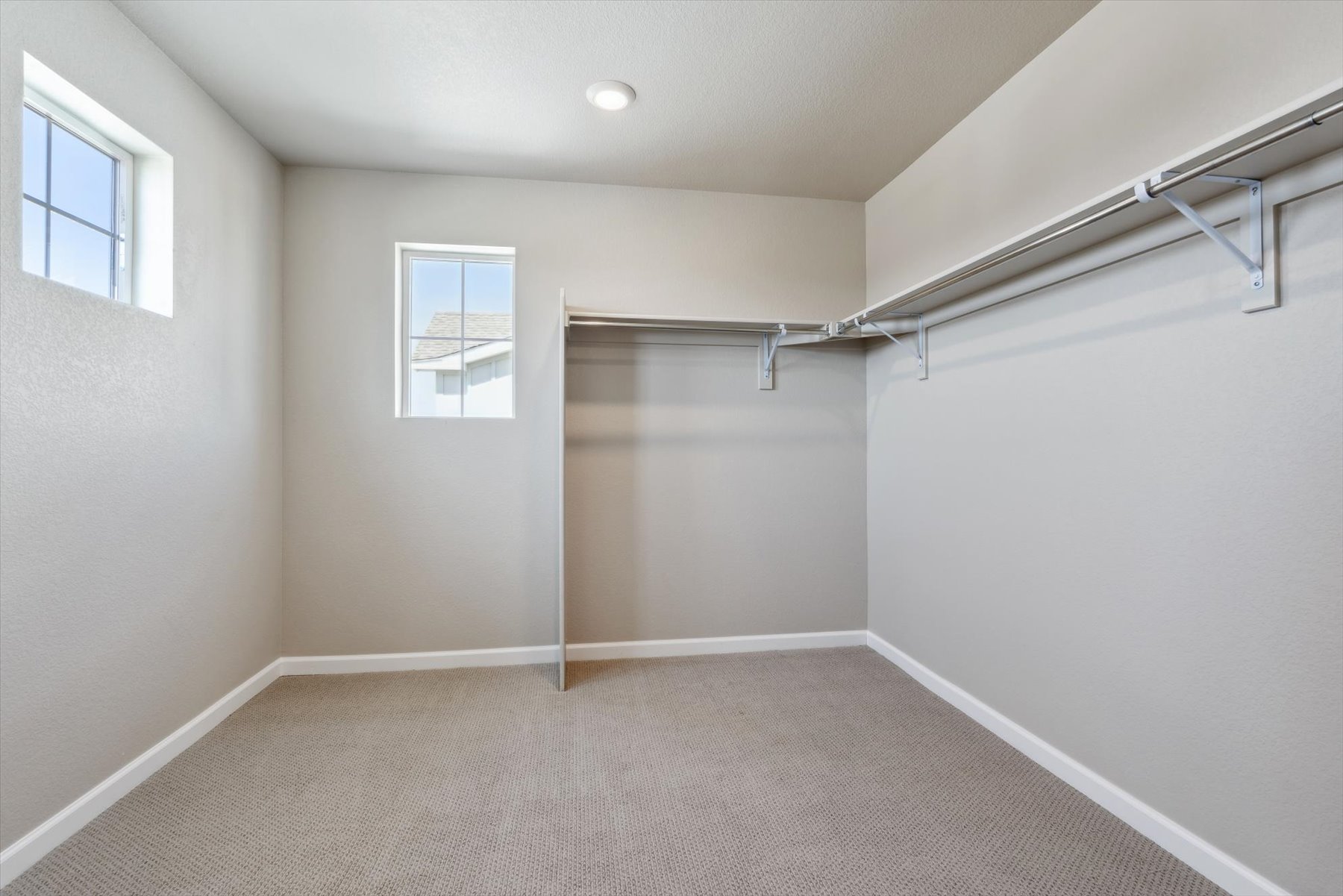 A room with a metal railing.