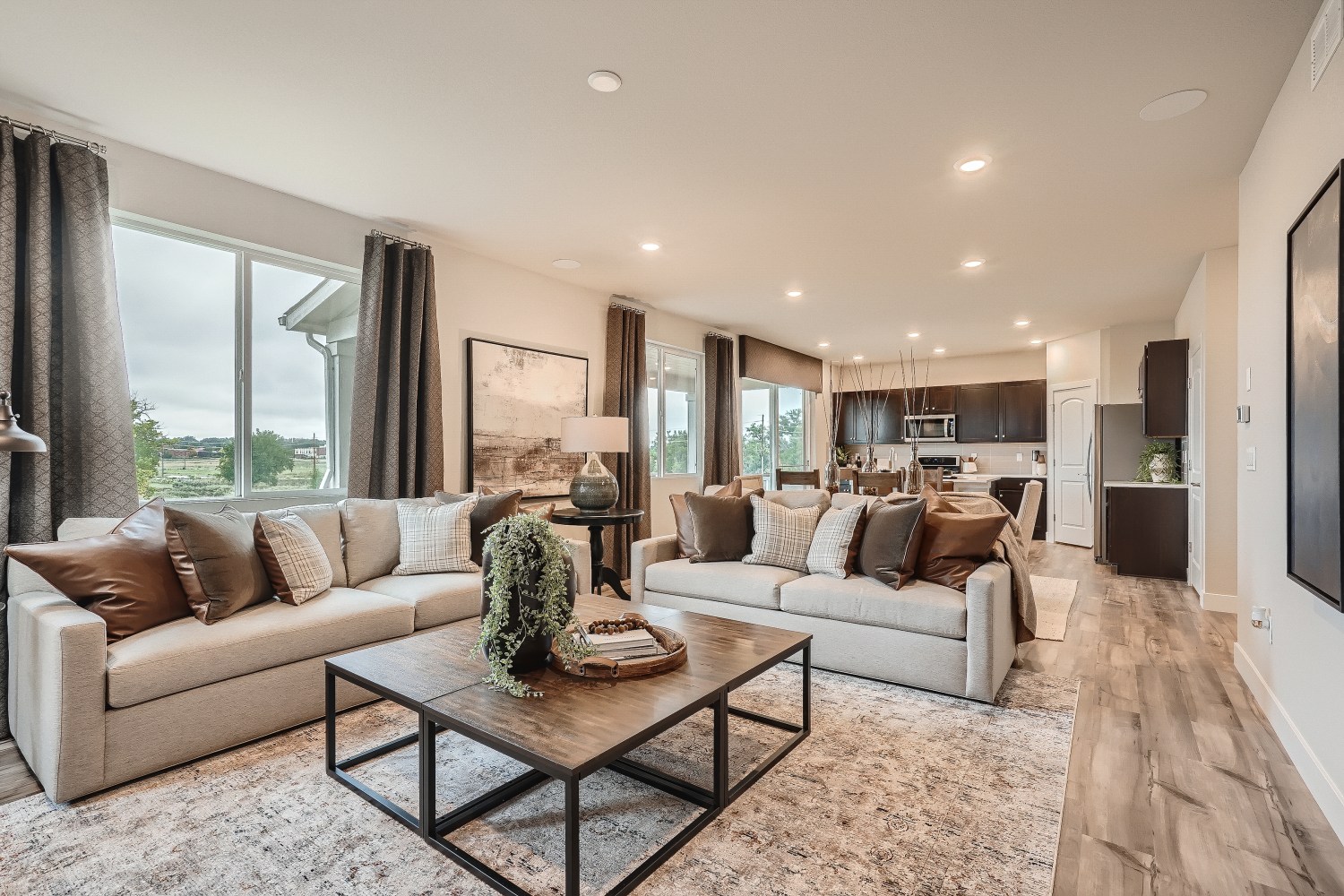 A living room with a large window.