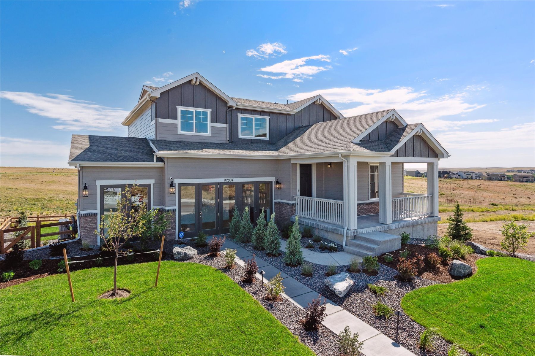 A house with a large front yard.