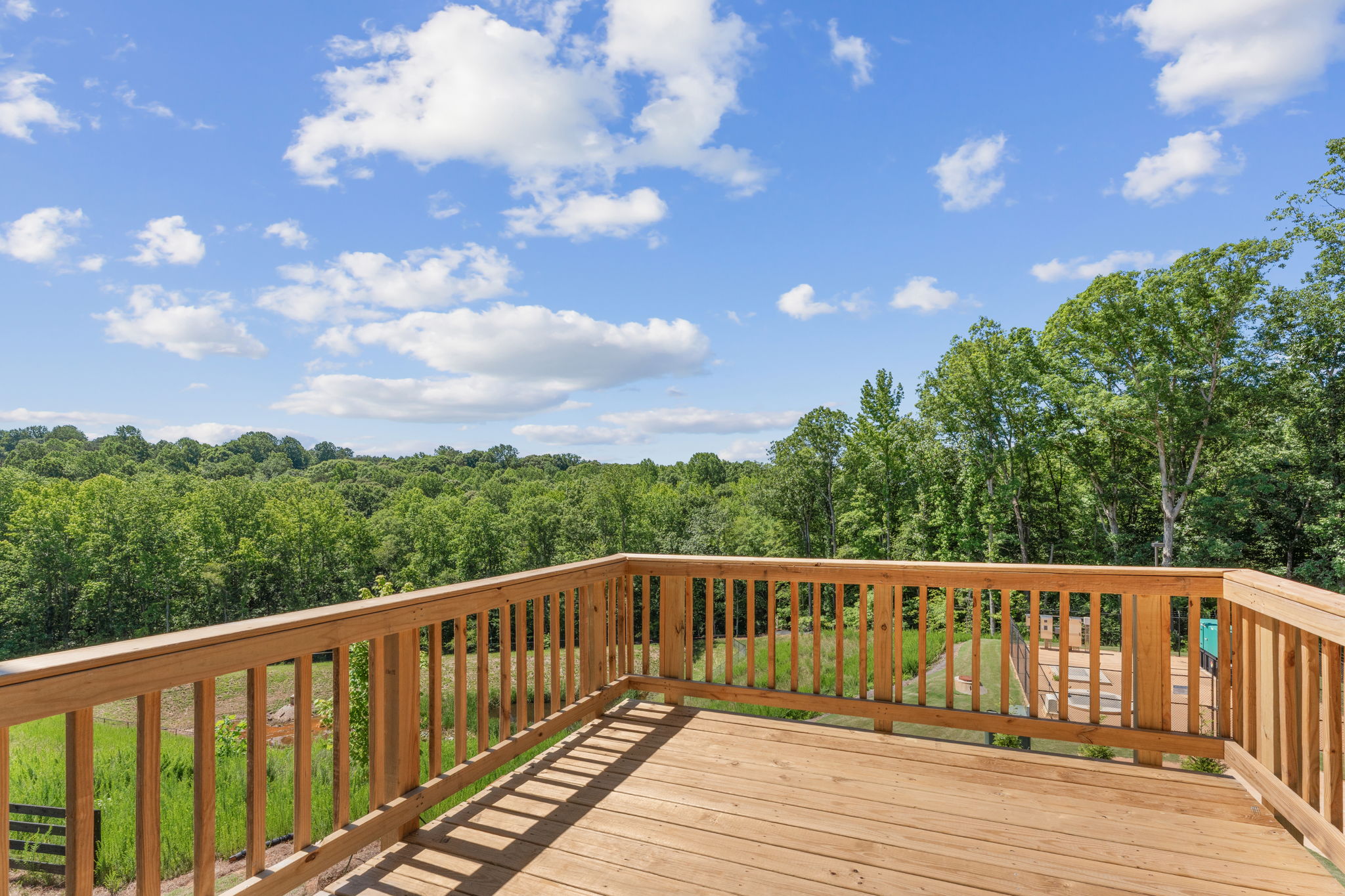 A wooden bridge over a river.