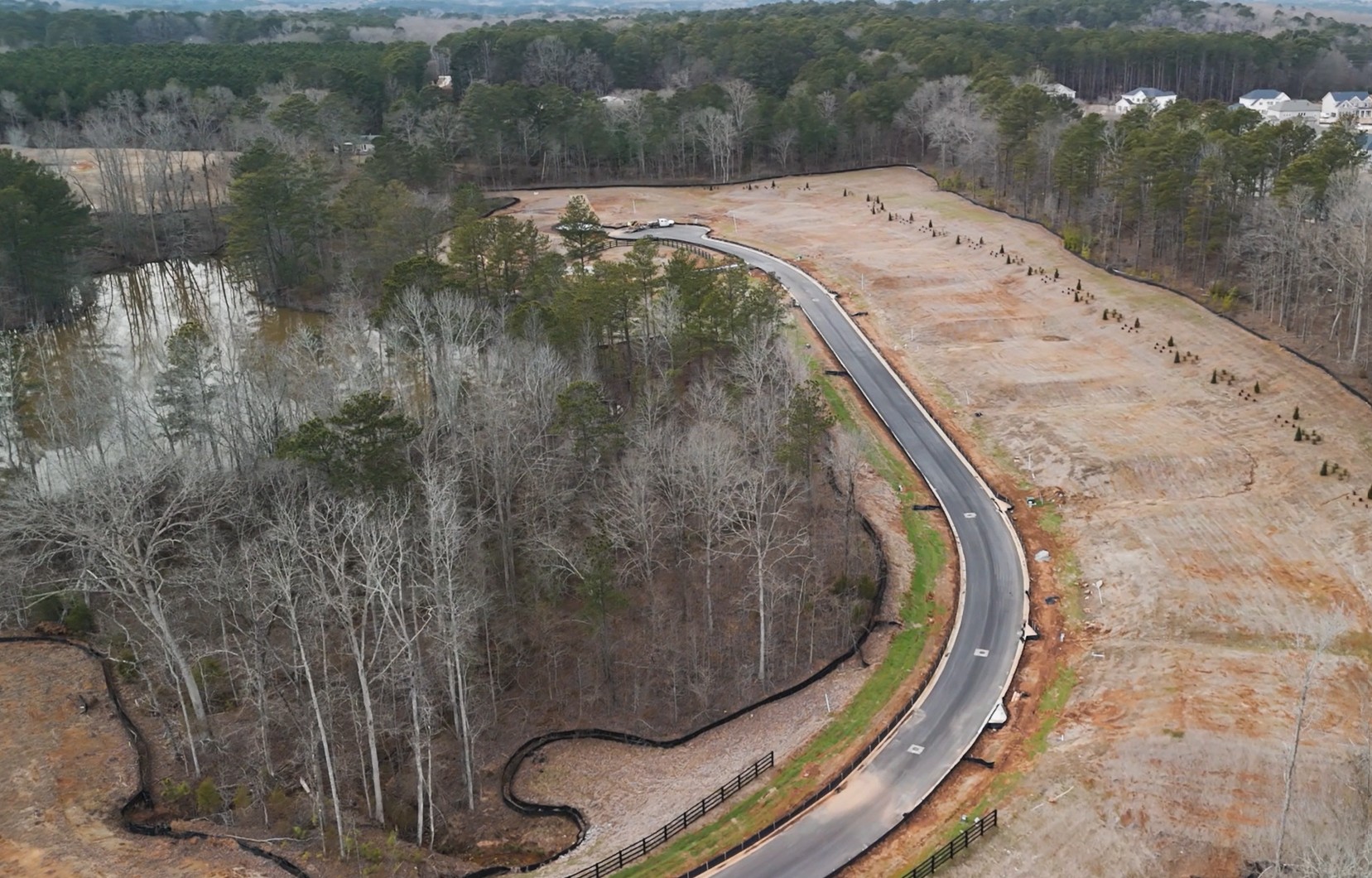 A road with trees on the side.