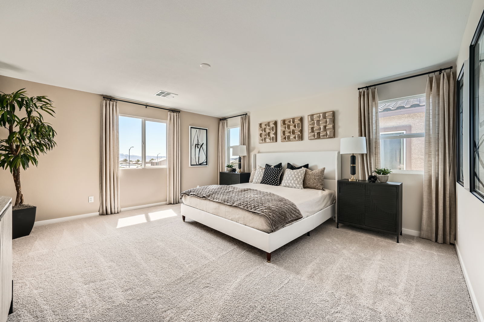 A bedroom with a large bed.