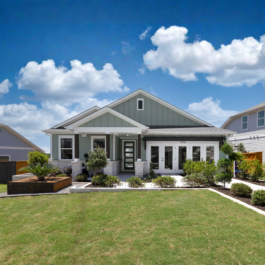 A house with a large front yard.