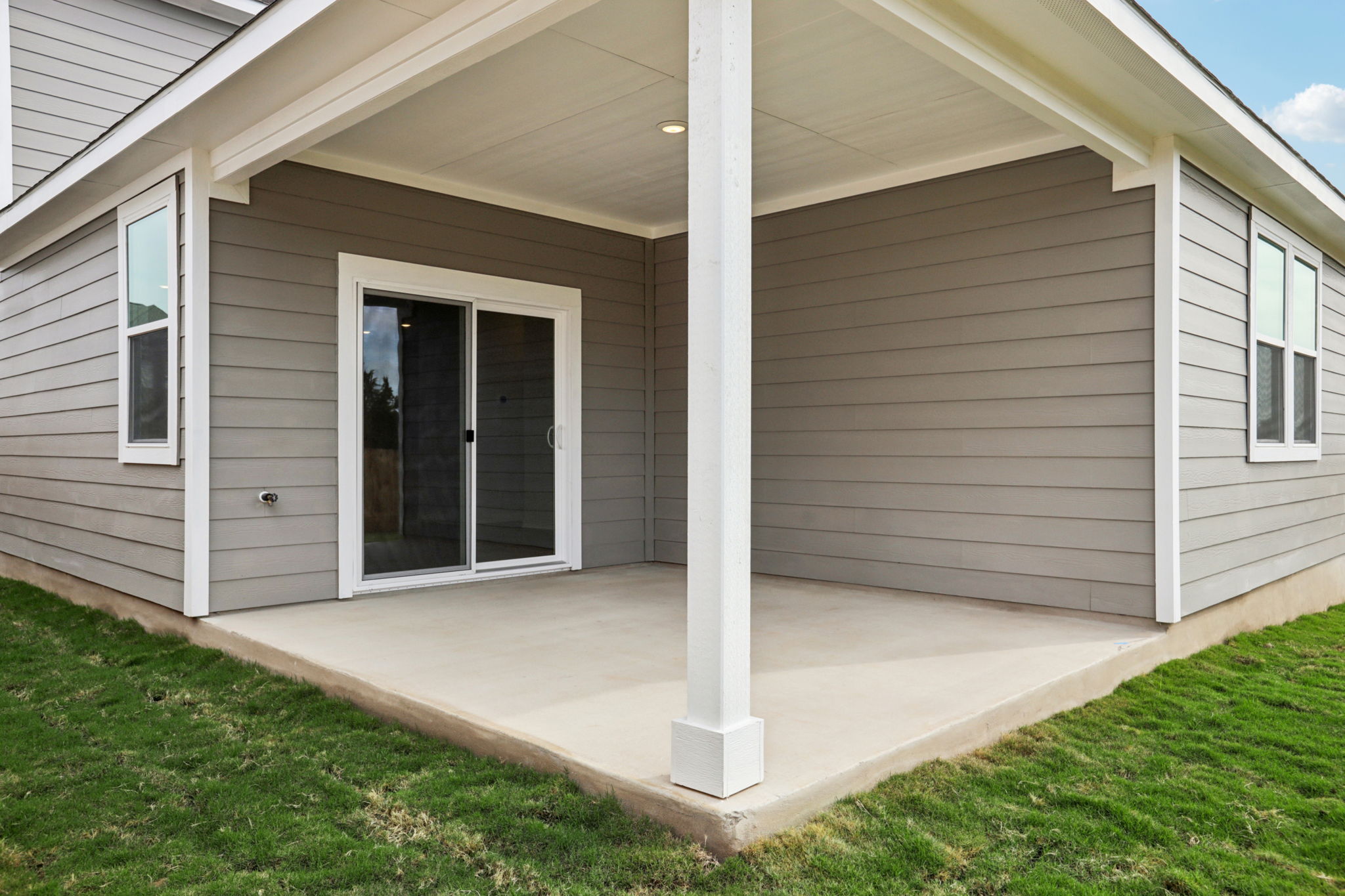 A house with a white column.