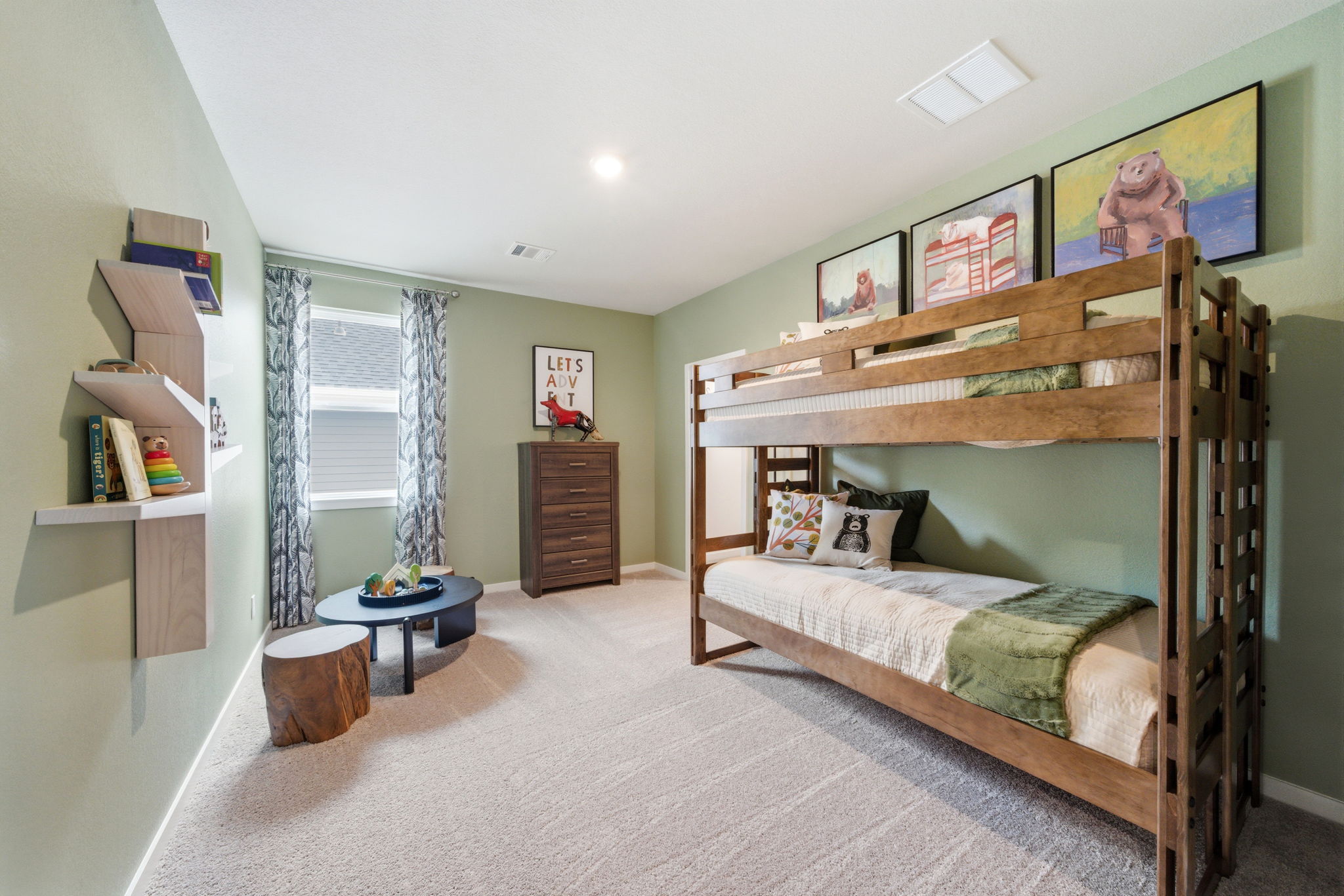 A bedroom with a bed and a bookcase.