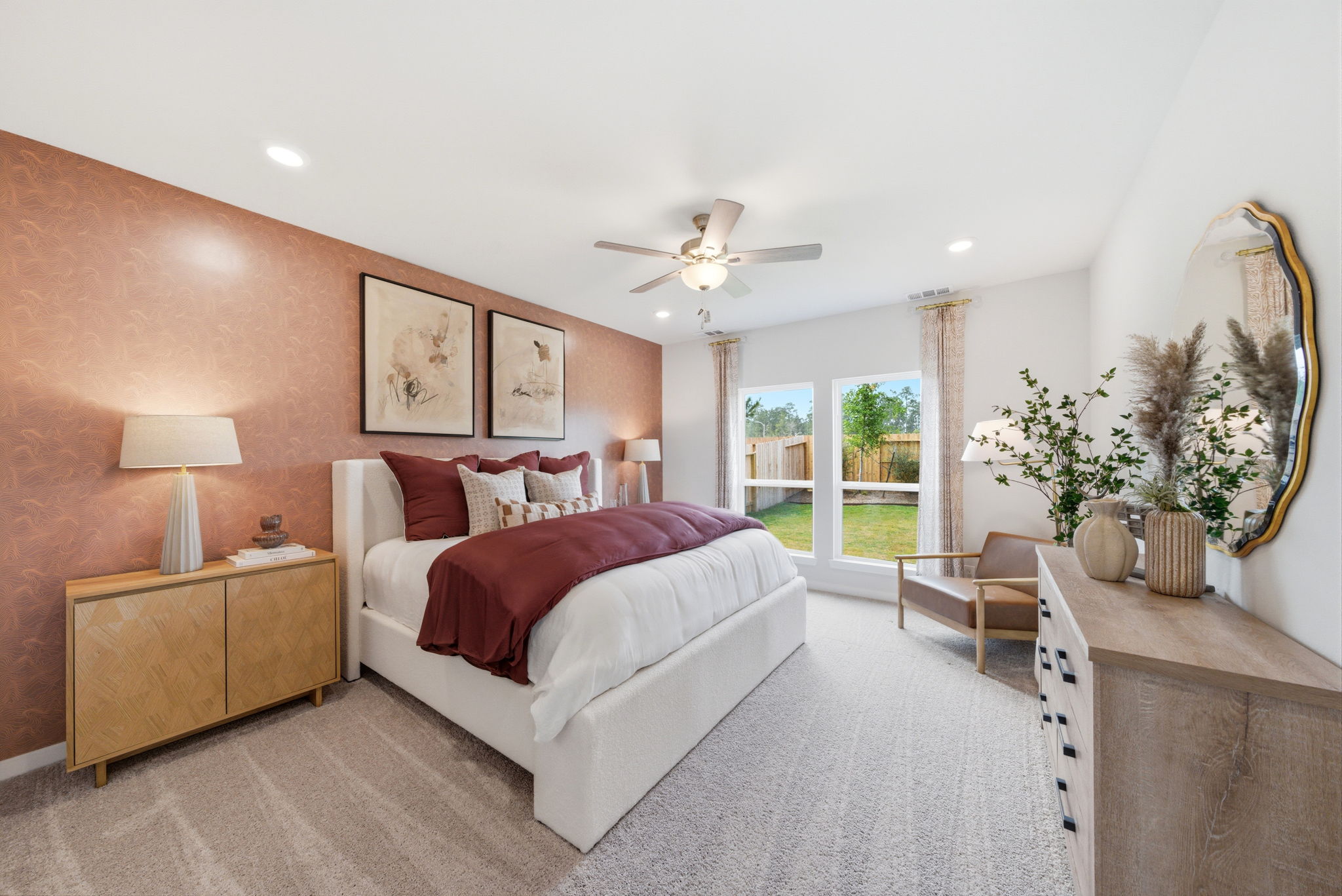 A bedroom with a large bed.