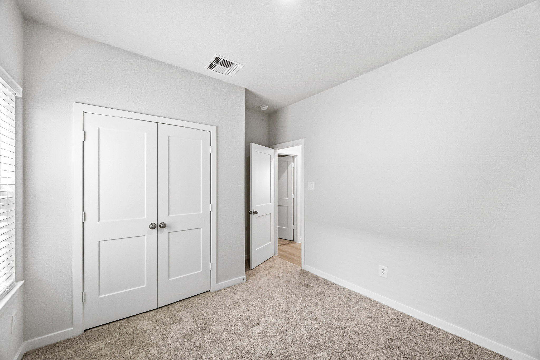 A room with white doors.