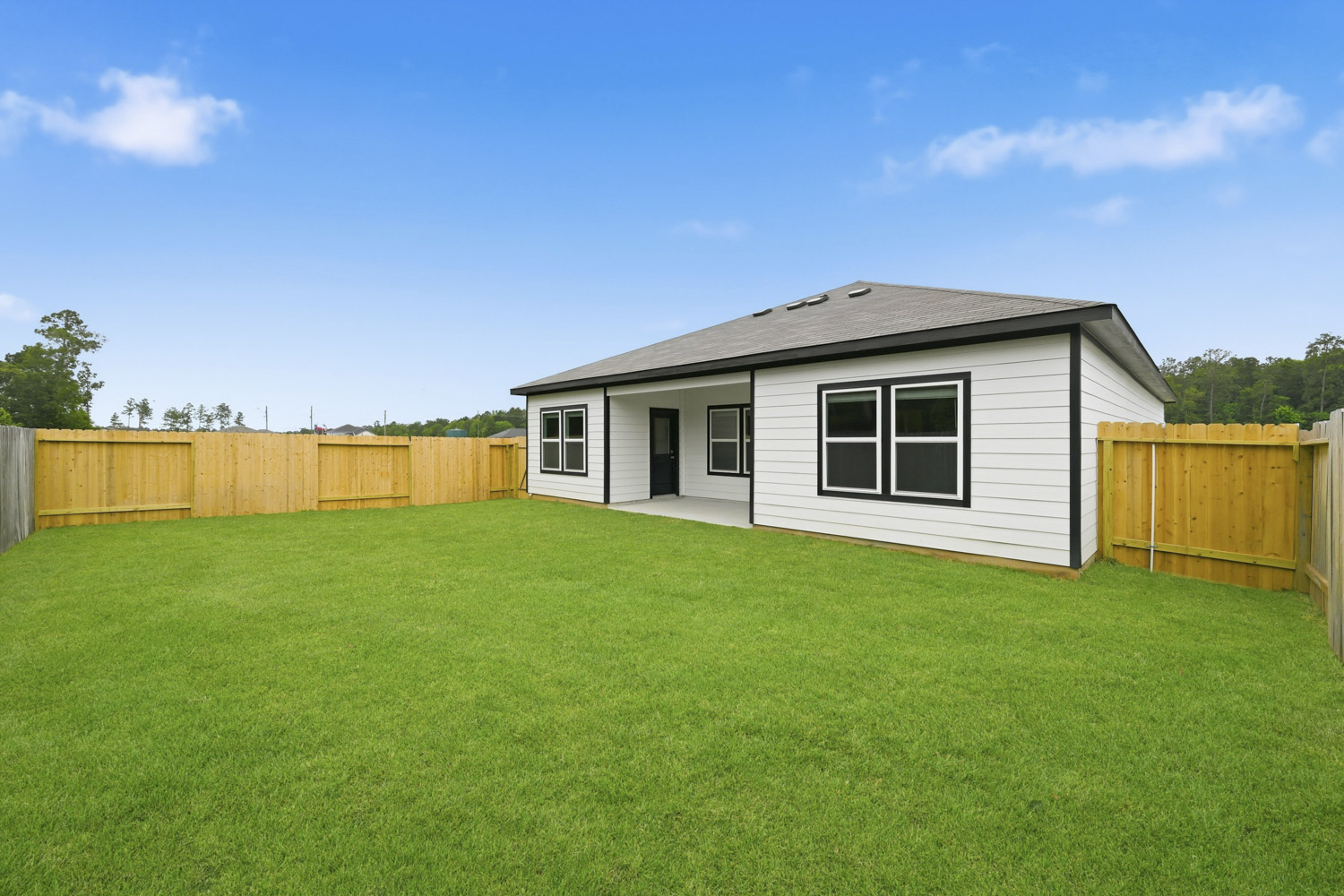 A house with a fence around it.