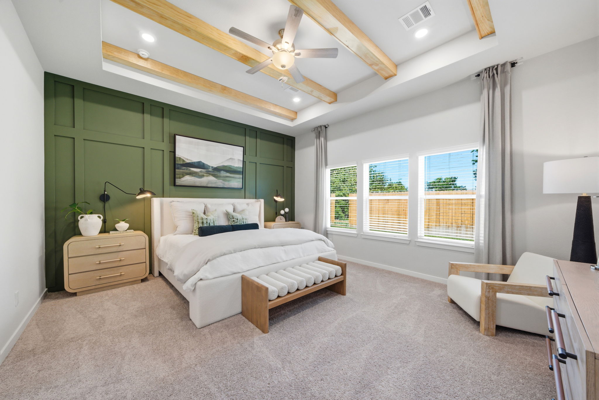A bedroom with a large bed.