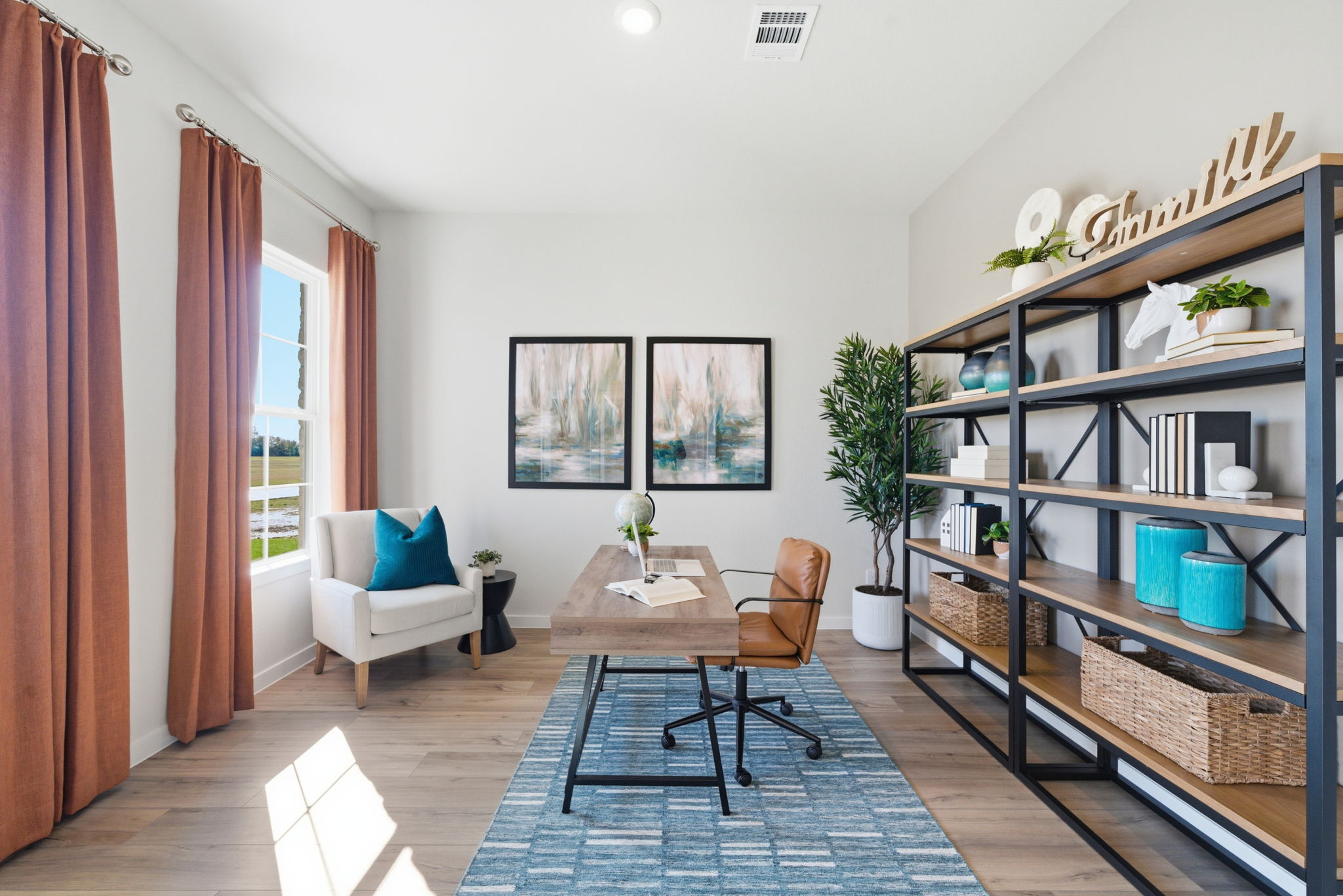 A room with a table and chairs.