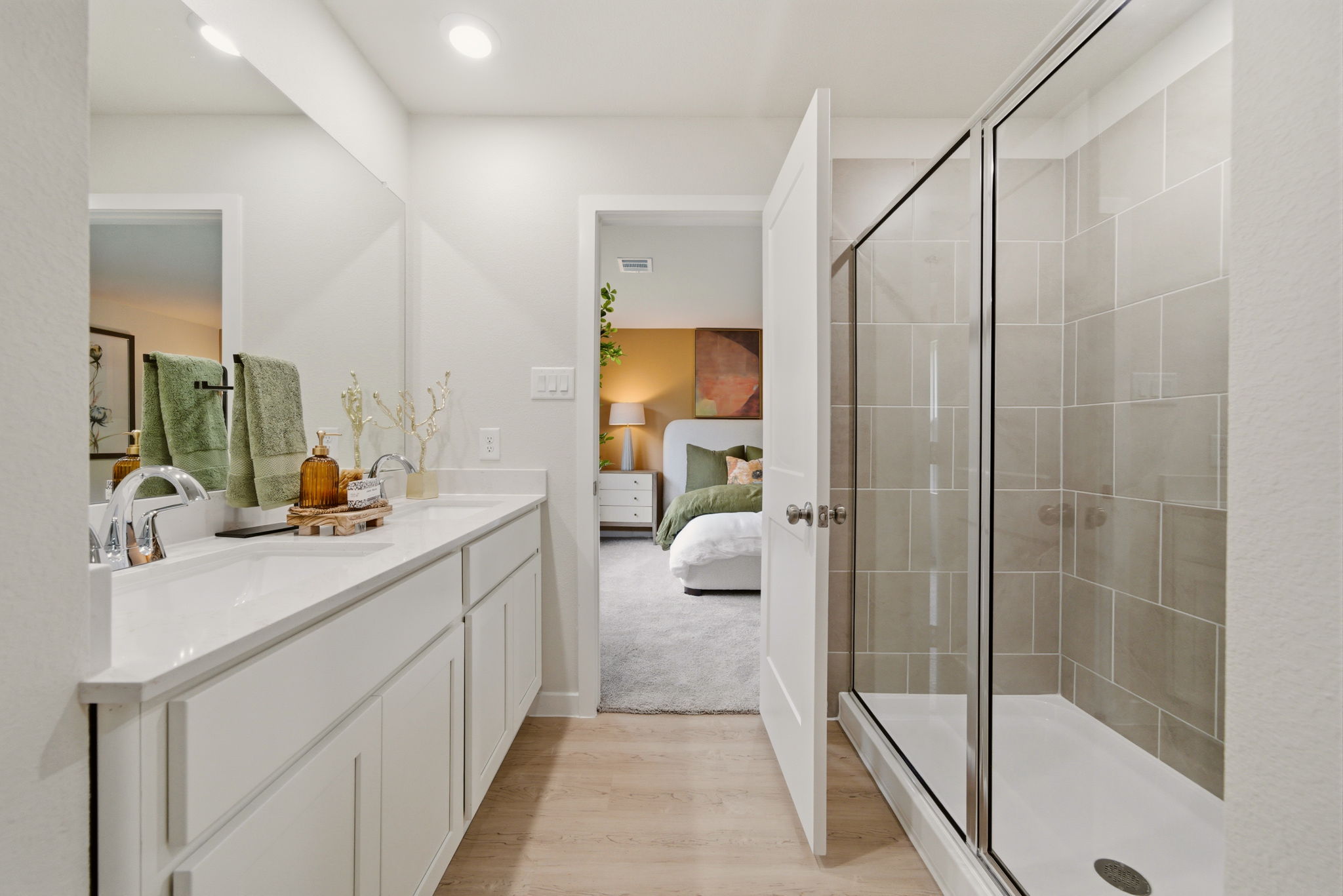 A bathroom with a glass shower.