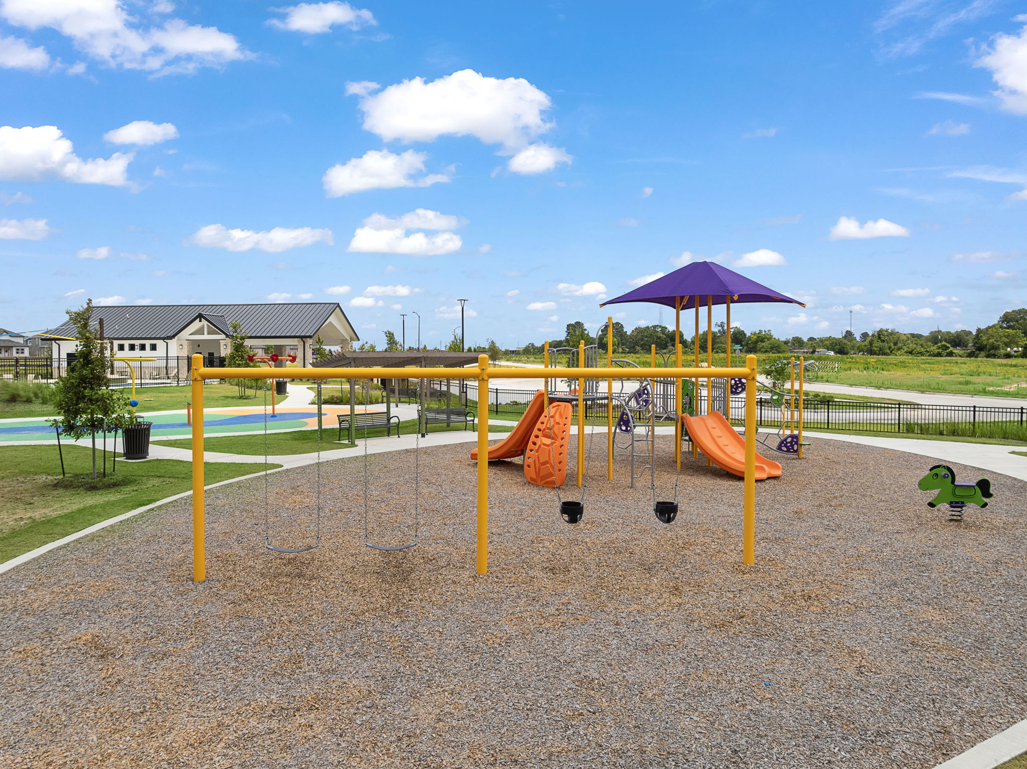A playground with a slide and a slide.