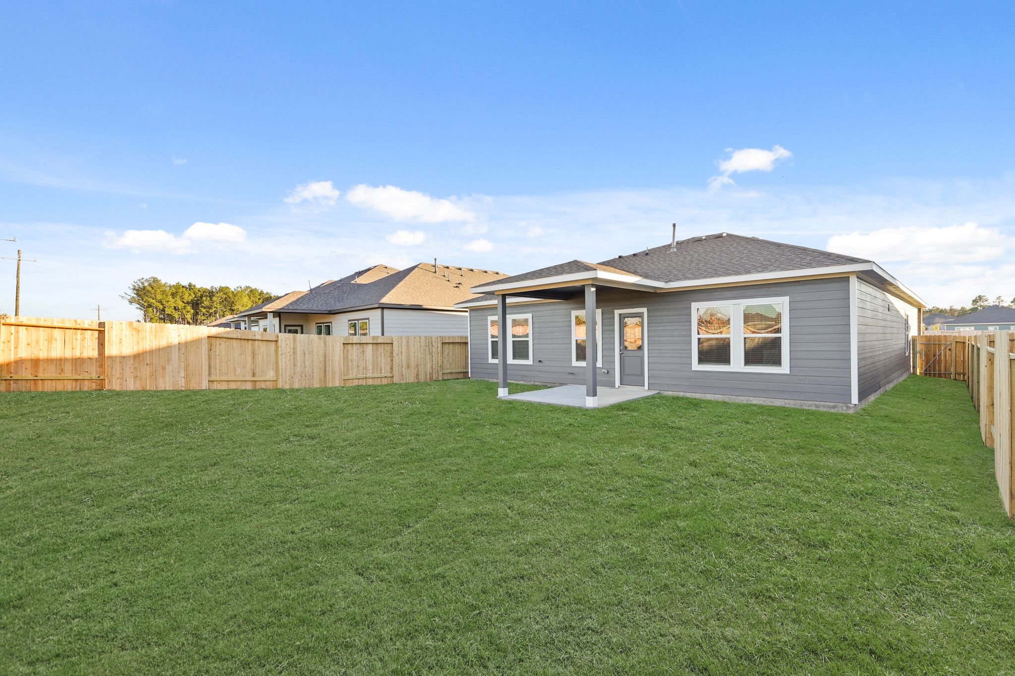 A house with a fence around it.