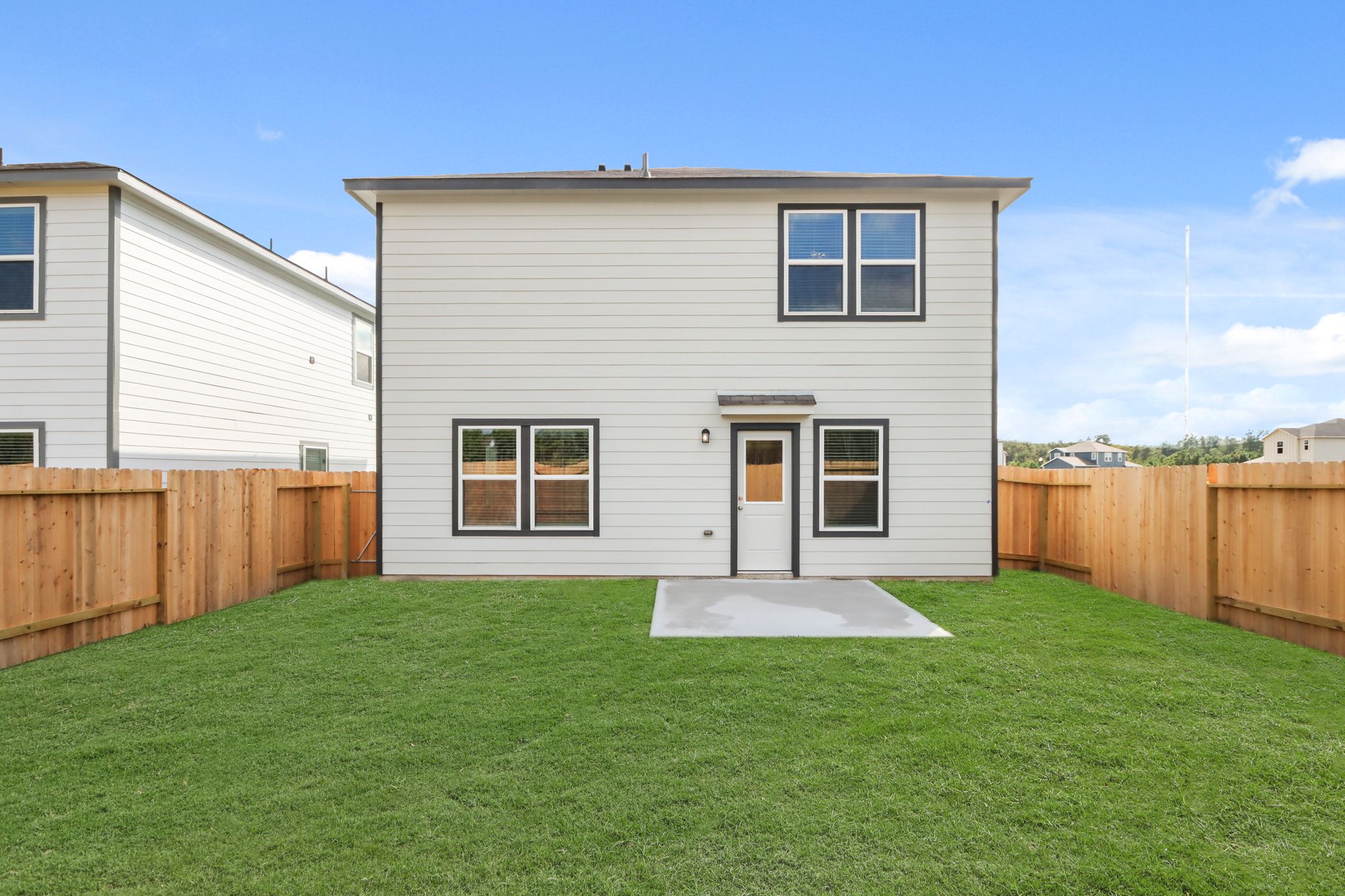 A house with a fence around it.