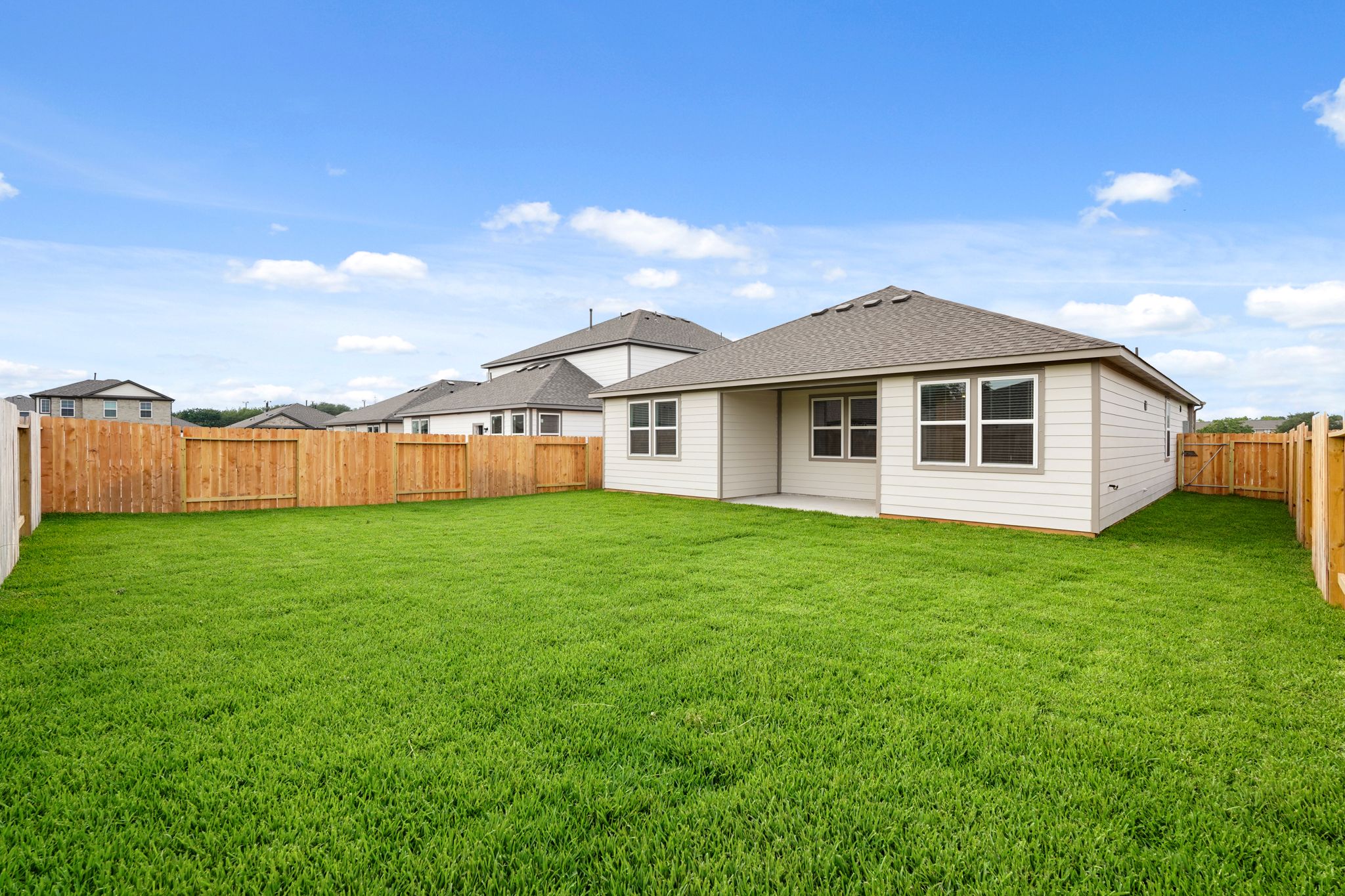 A house with a fence around it.