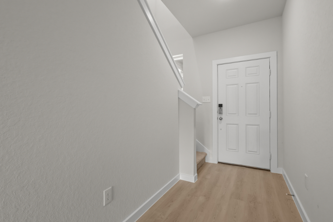 A white door in a room.