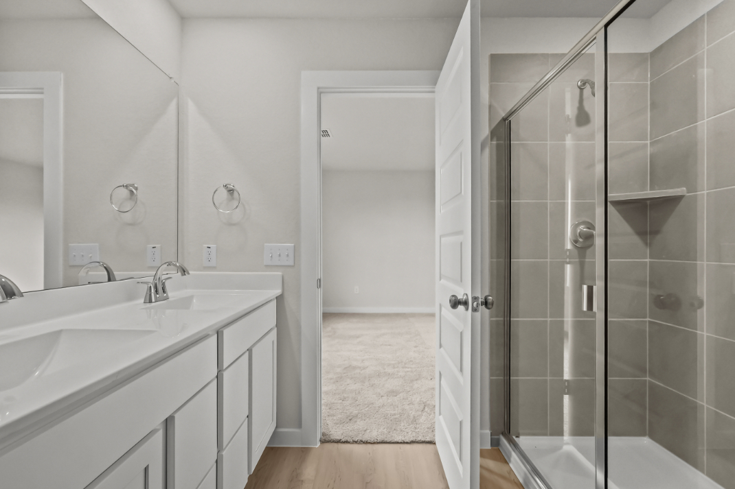 A bathroom with a glass shower.