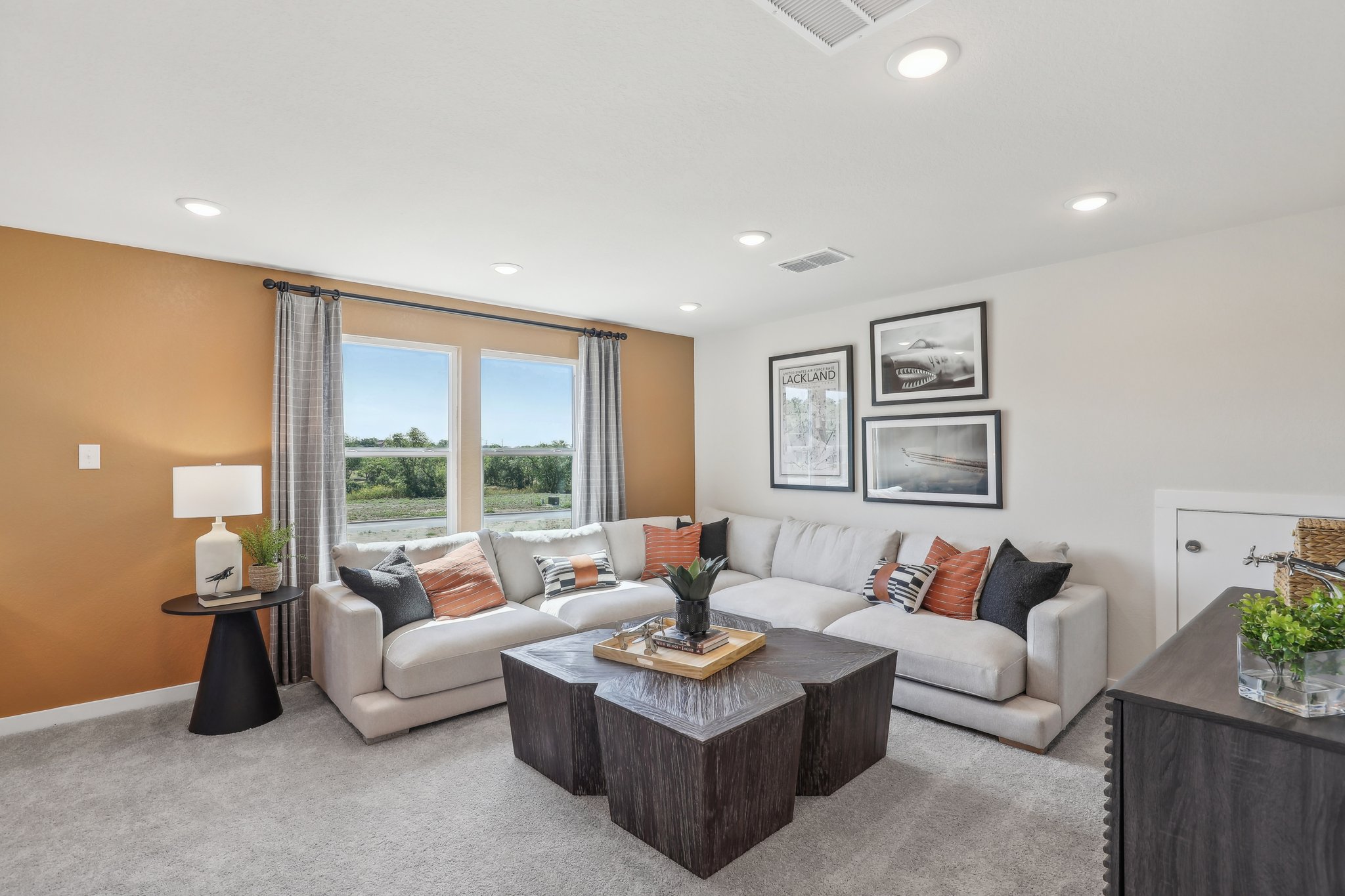 A living room with a couch and a coffee table.