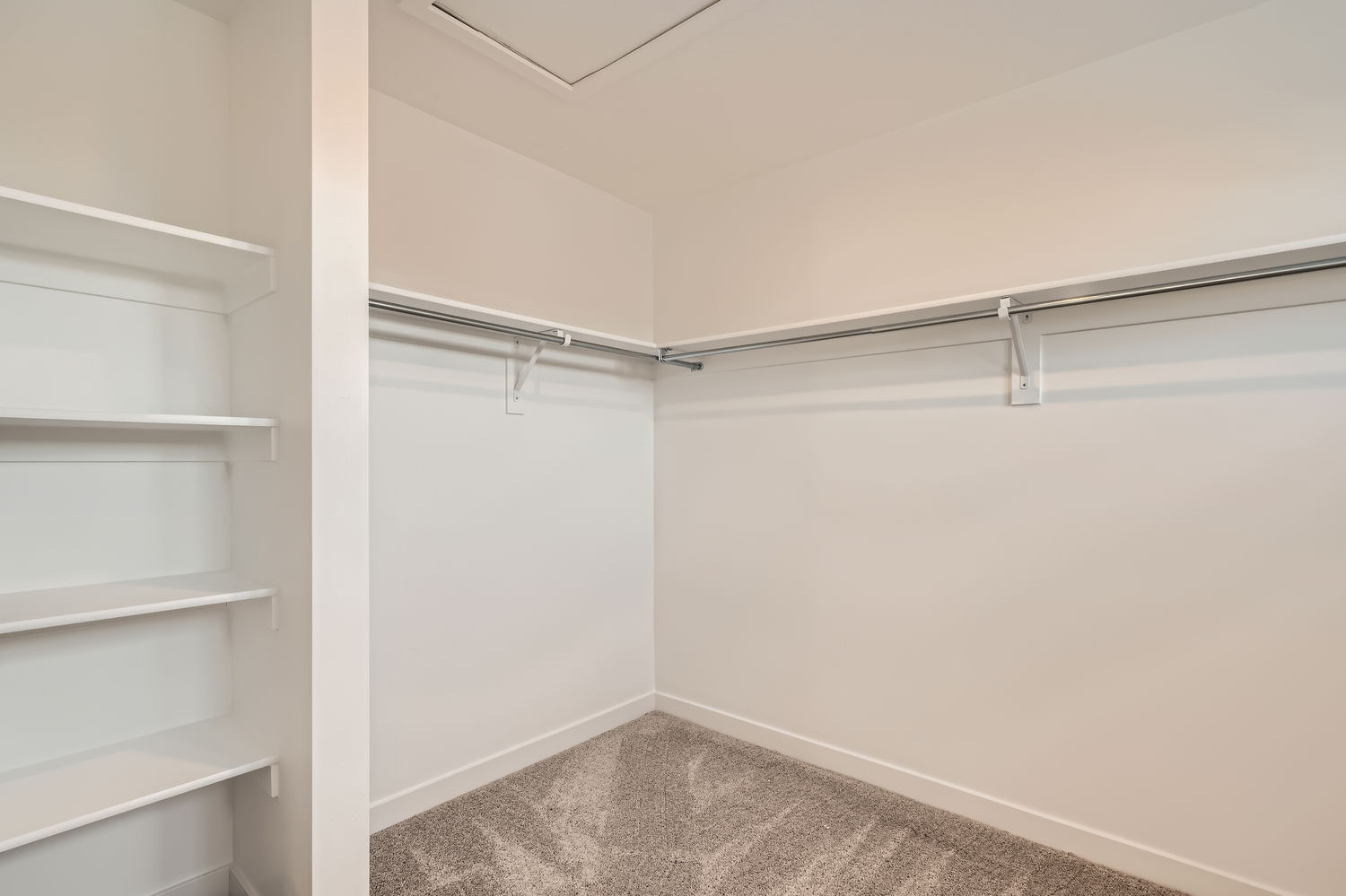 A white room with a white wall.