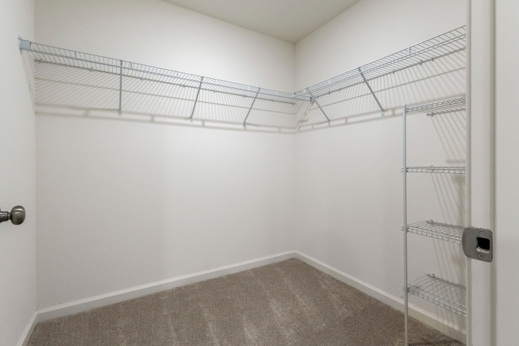 A room with a ladder and a metal ladder.