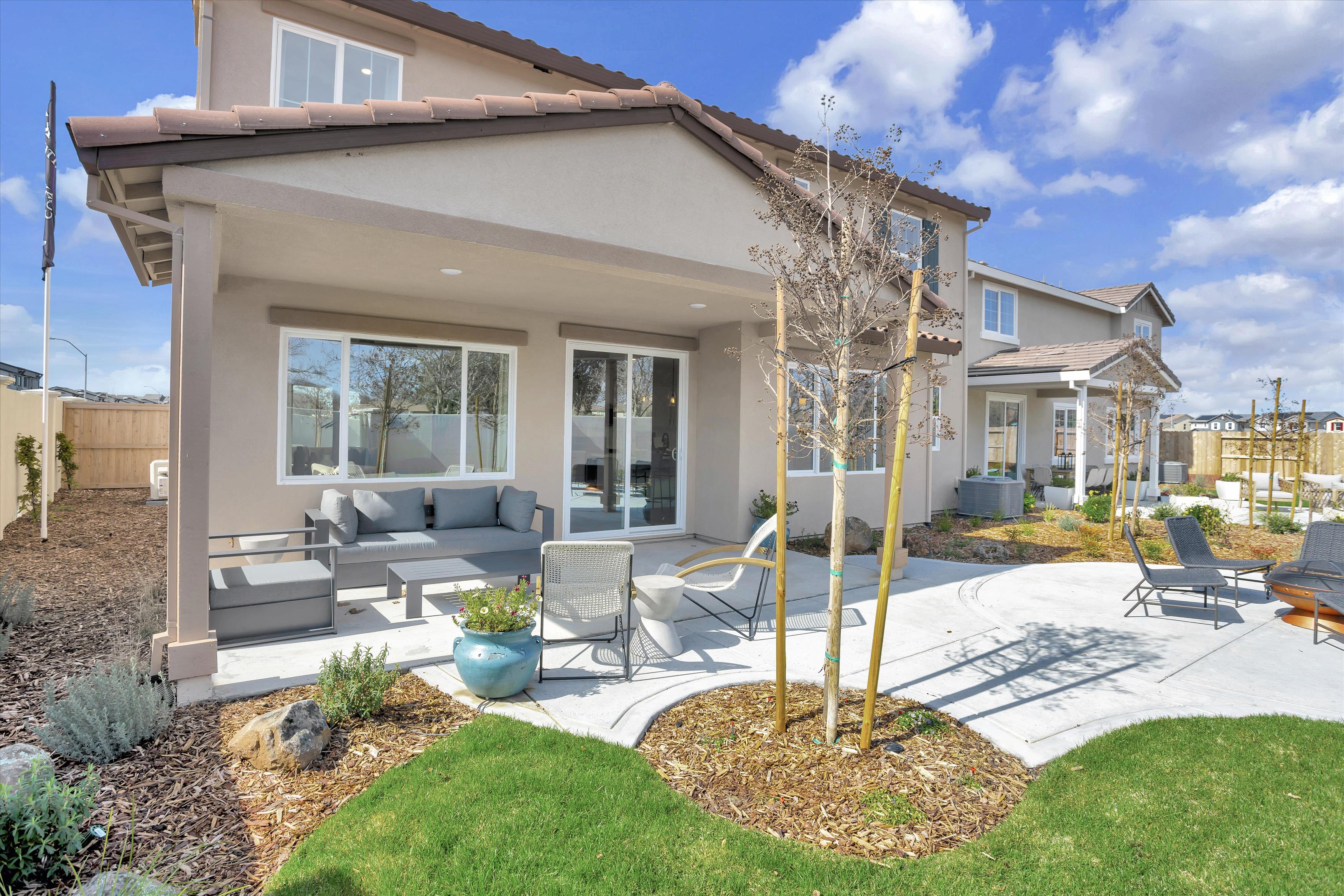 A house with a small patio.